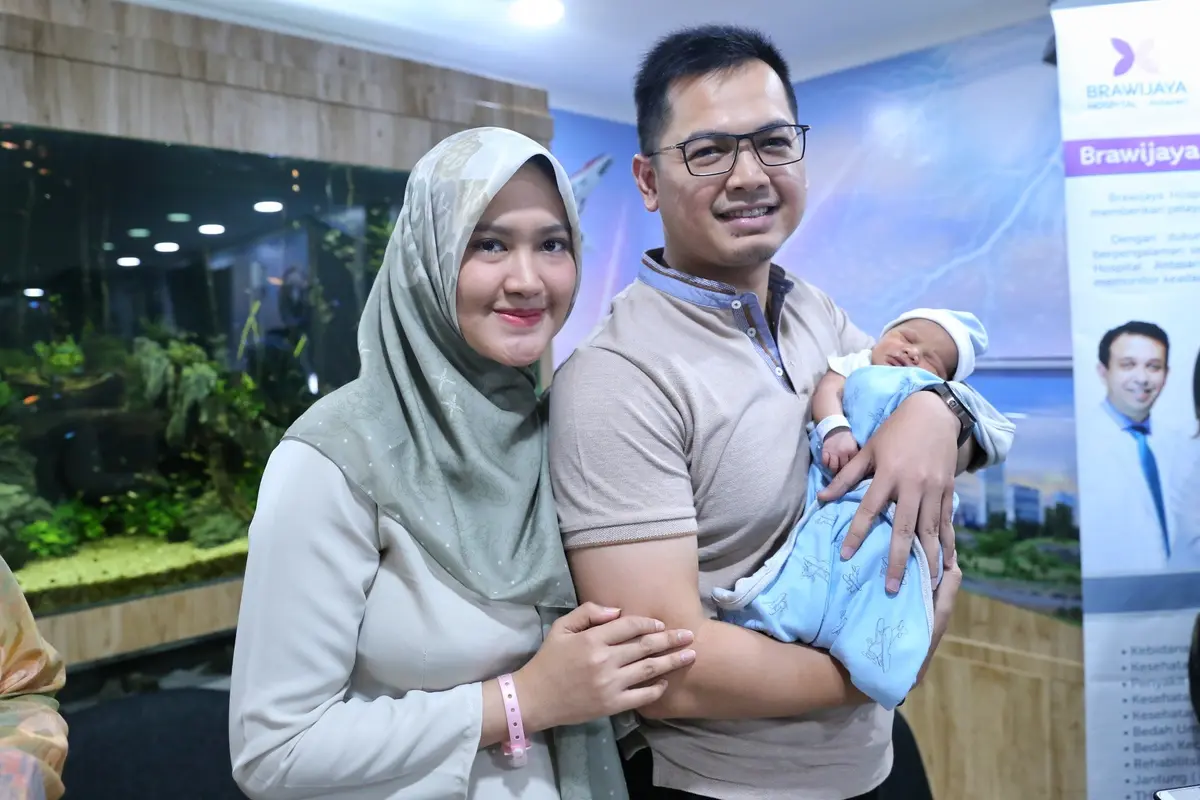 [Fimela] Tommy Kurniawan dan Lisya Nurrahmi