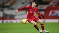 Andrew Robertson (LB) - Sosok pemain Liverpool ini terpilih menjadi fullback kiri. Ia tercatat mencapai harga 65 juta Euro menurut laman Transfermrkt. (Foto: AFP/Pool/Michael Regan)