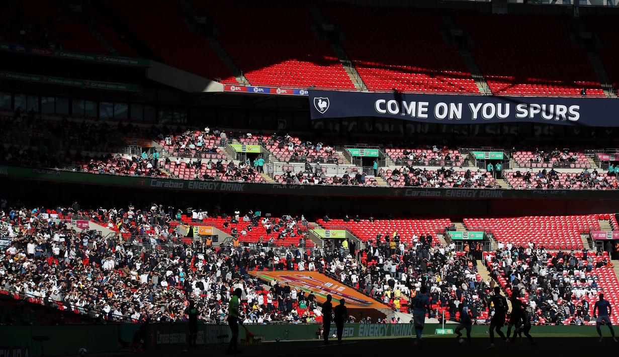 Pertandingan ini menjadi ajang uji coba kembalinya para penggemar sepak bola ke stadion di tengah pandemi Covid-19. (Foto: AFP/Pool/Carl Recine)