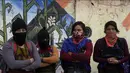 Anggota Tentara Pembebasan Nasional Zapatista (EZLN) menghadiri protes menentang kapitalisme dan invasi Rusia di Ukraina, di San Cristobal de las Casas, negara bagian Chiapas, Meksiko (13/3/2022). Zapatista menuntut penghentian perang dan berakhirnya kapitalisme. (AP Photo/Isabel Mateos)