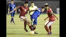 Pada pertandingan kedua saat melawan tuan rumah Filipina, Fachruddin Wahyudi Aryanto (kiri) mencetak gol pembuka pada menit ke-7. (AFP/Stringer)