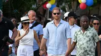 Meghan Markle dan Pangeran Harry berkunjung ke Kolombia. (dok. RAUL ARBOLEDA / AFP)