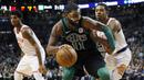 Pebasket Boston Celtics, Kyrie Irving, berusaha melewati pebasket Phoenix Suns, Tyler Ulis, pada laga NBA di Stadion TD Garden, Boston Minggu (3/12/2017). Boston Celtics menang 116-111 atas Phoenix Suns. (AP/Michael Dwyer)