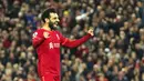 Pemain Liverpool Mohamed Salah melakukan selebrasi usai mencetak gol gawang Manchester United pada pertandingan sepak bola Liga Inggris di Stadion Anfield, Liverpool, Inggris, 19 April 2022. Liverpool menang 4-0. (AP Photo/Jon Super)