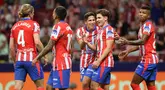 Penyerang Atletico Madrid, Julian Alvarez (kedua kanan) merayakan golnya pada pertandingan Liga Spanyol 2024/2025 melawan Valencia CF di stadion Metropolitano, Madrid pada 15 September 2024. (Pierre-Philippe MARCOU/AFP)