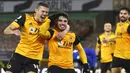 Pemain Wolverhampton Wanderers, Pedro Neto, melakukan selebrasi usai mencetak gol ke gawang Chelsea pada laga Liga Inggris di Stadion Molineux, Rabu (16/12/2020). Chelsea tumbang dengan skor 2-1. (Michael Steele/Pool via AP)