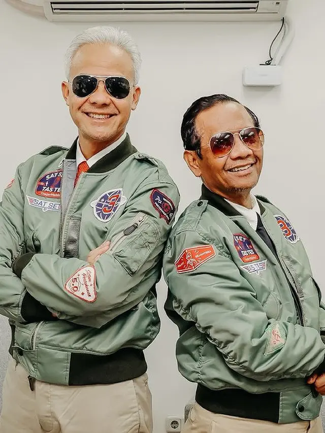 Gaya Ganjar Pranowo dan Mahfud MD saat Debat Capres Ketiga
