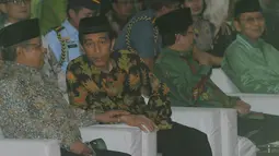 Mantan Wali Kota Surakarta dan mantan Gubernur BI ini duduk paling depan di antara ribuan kader muslimat NU yang hadir di Asrama Haji, Pondok Gede, Jakarta, Rabu (28/5/14). (Liputan6.com/Herman Zakharia)