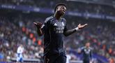 Gelar juara Liga Spanyol musim 2025/2026 milik Barcelona harus ditangguhkan setelah Vinicius Jr berhasil membawa Real Madrid meraih kemenangan atas Espanyol. (AFP/Josep Lago)