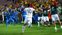 Gelandang Kolombia, James Rodriguez, saat sedang merayakan golnya ke gawang Paraguay. (Frederic J. Brown / AFP)