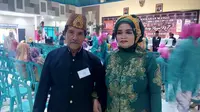 Kakek Munawi dan nenek Tarsini jadi salah satu peserta nikah massal di Malang, Jawa Timur (Liputan6.com/Zainul Arifin)