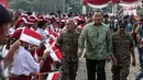 Tommy Soeharto usai mengikuti Apel Gelar Nasional Bela Negara 2016 di Silang Monas, Jakarta, Selasa (23/8). Apel diiikuti 10.000 peserta terdiri dari kementerian/lembaga terkait, TNI, Polri dan komponen bangsa lainnya. (Liputan6.com/Faizal Fanani)