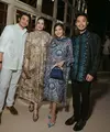 Chelsea Islan mengenakan dress coklat dengan embroidery floral dan kupu-kupu. Sedangkan Rob mengenakan kemeja putih lengan panjang berbordir. [@biyanofficial]