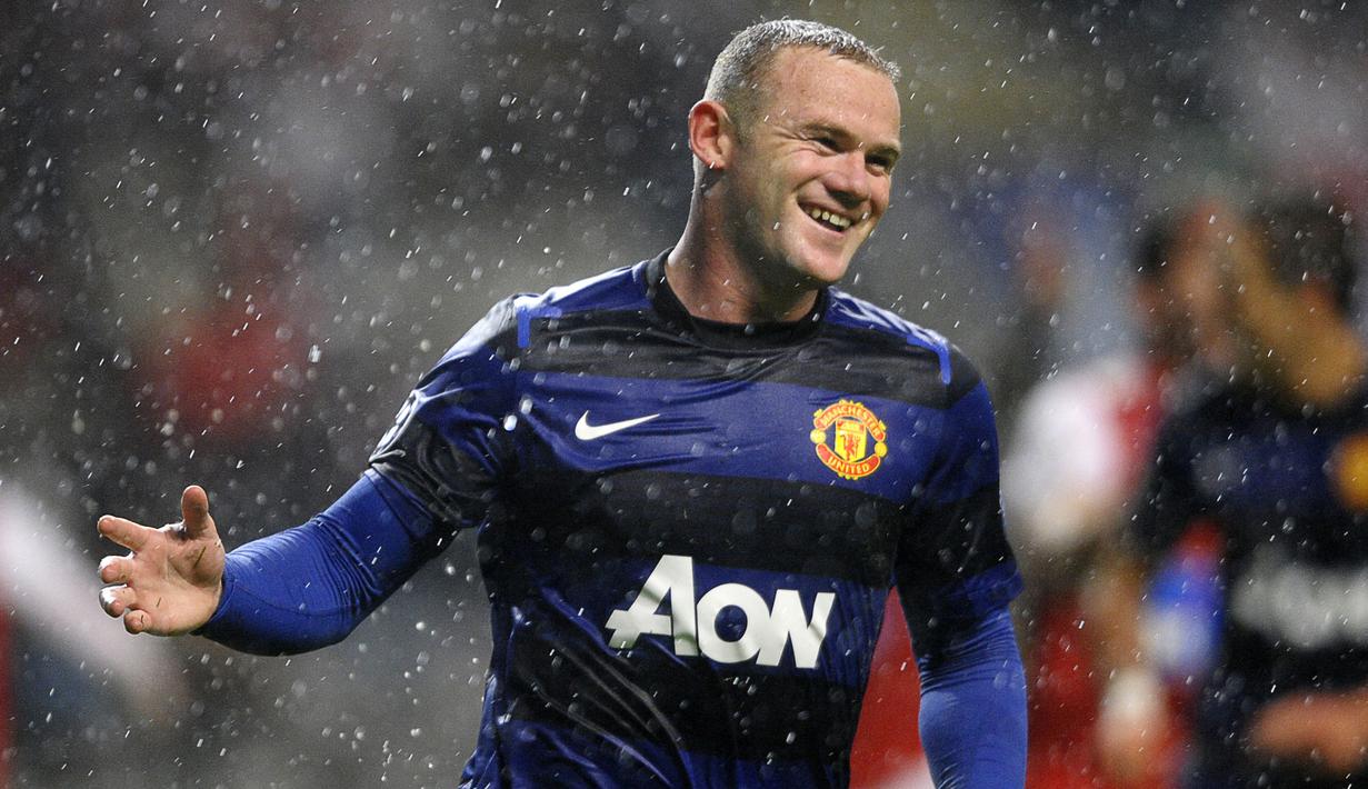 Pencetak gol tandang terbanyak di Liga Inggris adalah Wayne Rooney, dengan koleksi 94 gol. Ia juga tercatat sebagai pencetak gol terbanyak kedua di liga setelah Alan Shearer. Rooney mengumpulkan banyak koleksi trofi dalam 13 tahunnya bersama Setan Merah. (AFP/Miguel Riopa)