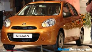 Nissan March Oranye.