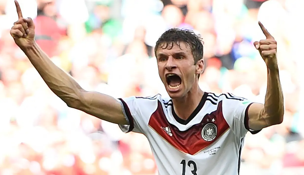 Gelandang Timnas Jerman, Thomas Mueller, menjadi pemain pertama yang mencetak hattrick di Piala Dunia 2014, (16/6/2014). (REUTERS/Dylan Martinez)