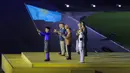 Pemberian bendera sebagai tanda penyerahan yang berlangsung di Rajamangala Stadium, Bangkok, Sabtu (20/12/2025) malam WIB menandai penyerahan dari Thailand kepada Malaysia yang menjadi tuan rumah SEA Games 2027.