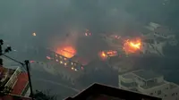 Angin kencang menyebarkan bara api akibat kebakaran hutan di Madeira (Reuters)