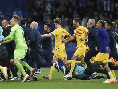 Barcelona memastikan diri menjadi juara La Liga Spanyol 2022/2023. Barcelona berhasil meraih kemenangan 4-2 atas Espanyol di RCDE Stadium pada laga jornada 34 La Liga Spanyol, Senin (15/5/2023). (AFP/Josep Lago)