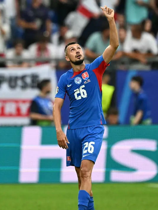 Penyerang Slovakia, Ivan Schranz saat laga babak 16 besar Euro 2024 melawan Inggris di Arena AufSchalke di Gelsenkirchen pada 30 Juni 2024. Di Euro 2024, Ivan Schranz berhasil mencetak tiga gol. (PATRICIA DE MELO MOREIRA/AFP)