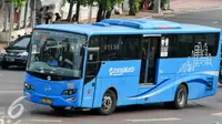 Bus Transjakarta melintas di wailayah Pasar baru, Jakarta, Kamis (26/5/2016). Transjakarta tambah perluasan wilayah cakupan hingga ke Kota Tangerang dengan 7 unit armada bus. (Liputan6.com/Yoppy Renato)