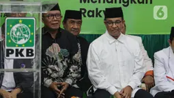 Anies tampil dengan mengenakan kemeja putih dan peci hitam. (Liputan6.com/Angga Yuniar)