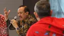 Sekjen Kemenkop Agus Muharram berdiskusi di Association of Strartup Indonesia, Jakarta, Jumat (10/3). Diskusi membahas bagaimana membsarkan tech strartup lokal dengan tetap menjaga kemerdekaan sebagai startup Indonesia. (Liputan6.com/Angga Yuniar)