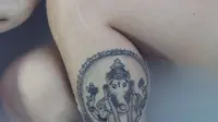 Seorang turis terancam dikuliti karena memiliki tato Ganesha di kakinya