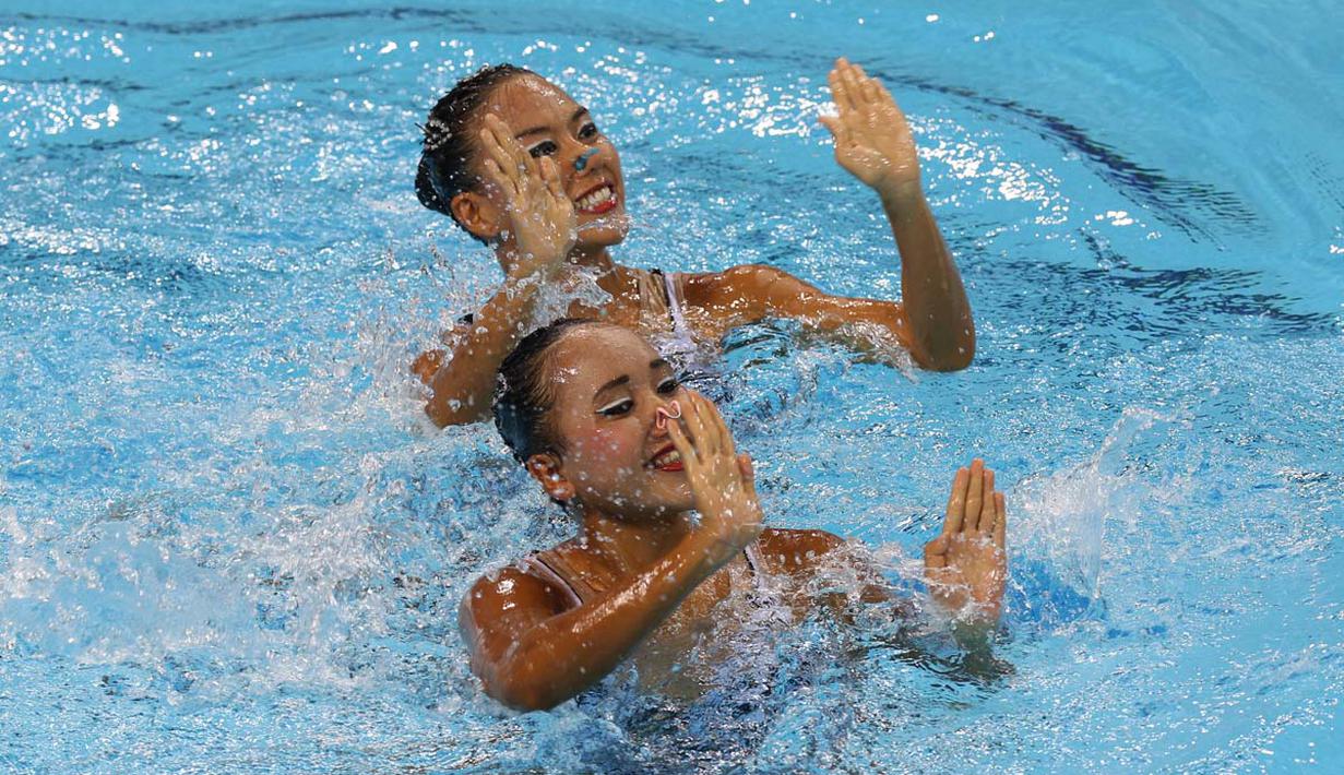 Aksi Adela Amanda Nirmala dan Claudia M. Suyanto.  (Bola.com/Arief Bagus) 