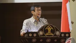 Menteri Hukum dan Hak Asasi Manusia Yasonna H Laoly memberi sambutan saat Konvensi Nasional Kebangkitan Hak Kekayaan Intelektual dan Ekonomi Kreatif, Jakarta, Selasa (25/11/2014). (Liputan6.com/Faizal Fanani)