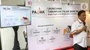 Direktur Ritel dan Syariah Babay Parid Wazdi Bank DKI memberi sambutan pada acara peluncuran Tabungan Pajak Bank DKI di Jakarta (30/3/2022). Wajib Pajak dengan rekening Tabungan Pajak dapat menentukan tanggal autodebet, mengangsur secara bulanan dan autodebet pembayaran PBB. (Liputan6.com/HO/BDKI)