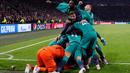 Selebrasi gol penentu Lucas Moura pada leg kedua semifinal Liga Champions yang berlangsung di Stadion Amsterdam Arena, Amsterdam, Kamis (9/5). Spurs menang 3-2 atas Ajax. (AFP/Adrian Dennis)