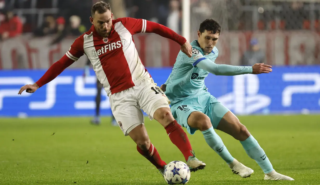 Barcelona melaju ke 16 besar didampingi oleh FC Porto yang sukses memenangi laga penentuan kontra Shakhtar Donetsk. (AP Photo/Geert Vanden Wijngaert)