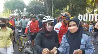 Aksi damai LAN Surabaya sosialisasikan tolak lagalisasi ganja kepada masyarakat di Taman Bungkul. (Dian Kurniawan/Liputan6.com).