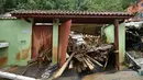 Pemandangan rumah yang terkena banjir di distrik Juquehy di Sao Sebastiao, negara bagian Sao Paulo, Brasil (20/2/2023). Banjir dan tanah longsor yang dipicu oleh hujan lebat di Brasil merenggut sedikitnya 36 nyawa pada akhir pekan Karnaval di tenggara negara bagian Sao Paulo. (AFP/Nelson Almeida)