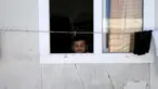 Bocah Yazidi, Emad saat berada di rumahnya di kamp pengungsian dekat Kota Duhok, Irak, pada 19 April 2016. Sejumlah anak laki-laki Yazidi dipaksa mengikuti latihan untuk menjadi penerus militan ISIS. (REUTERS / Ahmed Jadallah)
