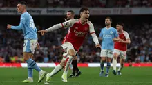 Gabriel Martinelli mencetak gol tunggal kemenangan Arsenal atas Manchester City pada laga pekan kedelapan Premier League di Stadion Emirates, Minggu (8/10/2023) malam WIB. (AFP/Adrian Dennis)