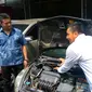 Mobil hasil curian dioplos dengan kendaraan rusak bekas kecelakaan yang masih memiliki dokumen lengkap. (Liputan6.com/Nafiysul Qodar)
