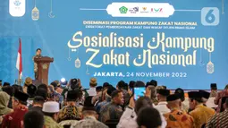 Dirjen Bimas Islam Kamaruddin Amin menyampaikan sambutan saat menghadiri sosialisasi Kampung Zakat Nasional di Jakarta, Kamis (24/11/2022). Kampung Zakat yang berkolaborasi dengan Kemenag, Baznas, LAZ, dan Pemda se-Indonesia untuk pemanfaatan zakat dalam rangka membantu pemerintah dalam pengentasan kemiskinan telah tersebar di 18 titik. (Liputan6.com/Faizal Fanani)