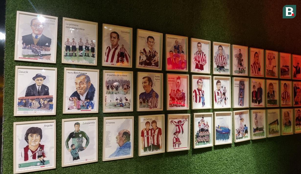 <p>Karikatur para legenda dan mantan pemain Bilbao dipasang di dinding museum klub. (Bola.com/Yus Mei Sawitri)</p>