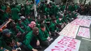 Mahasiswa melakukan aksi protes terhadap kenaikan harga Bahan Bakar Minyak (BBM) non-subsidi dan program Makan Bergizi Gratis (MBG) di Jakarta, Senin 15 Juni 2026. (Aditya Irawan/AFP)