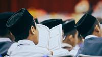 Membaca Al-Qur'an (Pexels)