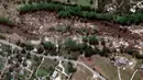 Gambar selebaran milik Maxar Technologies ini menunjukkan jalan raya negara bagian Texas 39 setelah banjir bandang di sepanjang Sungai Guadalupe di Hunt, Texas pada 8 Juli 2025. (Foto oleh Citra satelit ©2025 Maxar Technologies/AFP)