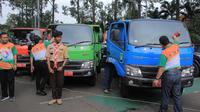 Sebanyak tiga unit truk pemilah sampah bakal diterjunkan di Kota Tangerang, Banten untuk memilah sampah. (Liputan6.com/Pramita Tristiawati)