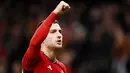Diogo Dalot menjadi salah satu bintang kemenangan MU lewat gol indahnya di babak pertama. Ia juga tampil disiplin di lini pertahanan Setan Merah. (AFP/Oli Scarff)