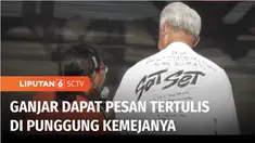 Capres nomor urut 3, Ganjar Pranowo menghadiri kampanye terbuka di Lapangan Merdeka, Ambon, Maluku. Di kampanye bertajuk, Hajatan Rakyat ini, salah satu tokoh masyarakat Ambon diberi kesempatan untuk menuliskan aspirasi di bagian punggung kemeja puti...