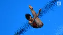 Atlet loncat indah saat tampil di final springboard 1m putri Asian Games 2018, Aquatic Centre, GBK, Jakarta, Jumat (31/8). Nomor ini dimenangkan oleh Wang Han asal China yang berhasil mendapatkan total skor 323.55. (Merdeka.com/Imam Buhori)