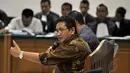 Mantan Kadishub DKI Jakarta, Udar Pristono menjadi saksi pada sidang dugaan korupsi Bus Transjakarta di pengadilan Tipikor, Jakarta, Senin (3/11/2014). (Liputan6.com/Miftahul Hayat)