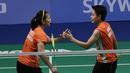 Ganda Indonesia, Greysia Polii / Apriyani Rahayu, saat melawan ganda Thailand, Chayanit Chaladchalam / Phataimas Muenwong pada final SEA Games 2019 di Muntinlupa Sports Complex, Manila, Senin (9/12). Pasangan Indonesia menang 21-3 dan 21-8. (Bola.com/M Iqbal Ichsan)