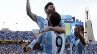 Lionel Messi melakukan selebrasi usai mencetak gol ke gawang Venezuela, Minggu (19/6/2016) di Copa America. (Winslow Townson-USA TODAY Sports)